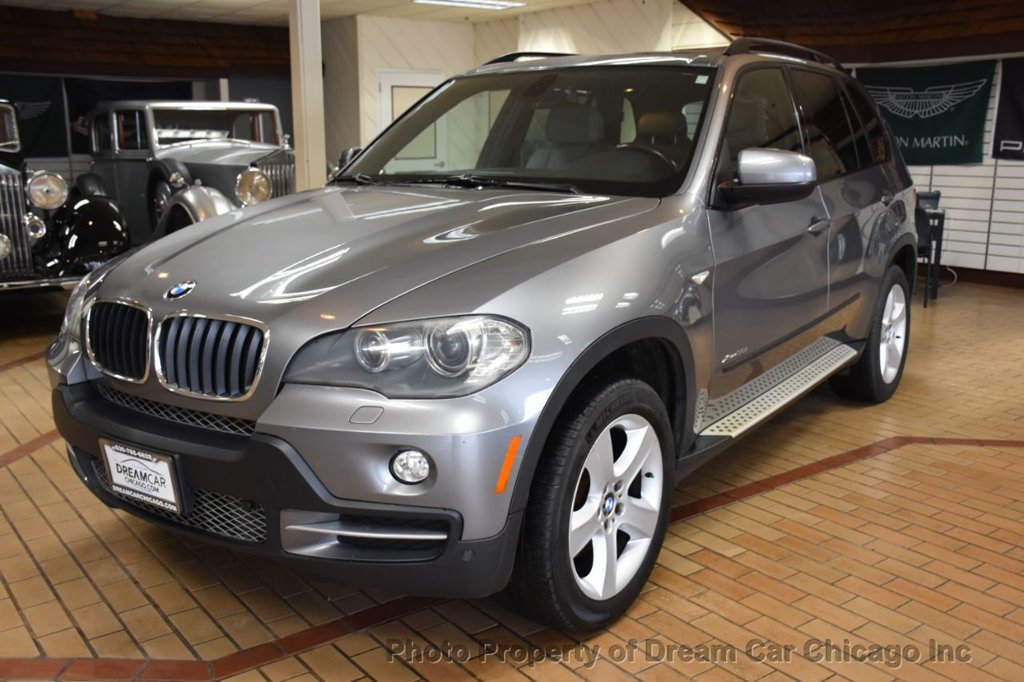 download BMW X5 30I workshop manual