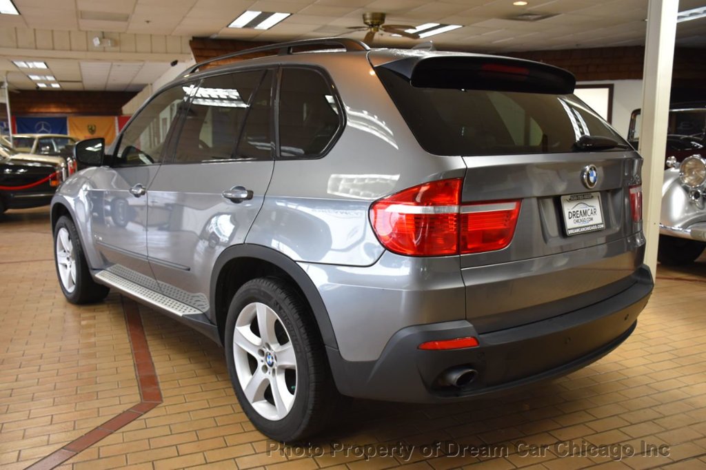 download BMW X5 30I workshop manual